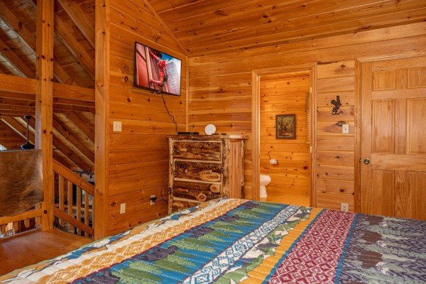 Bedroom amenities at The Roost, a 2 bedroom cabin rental located in Pigeon Forge