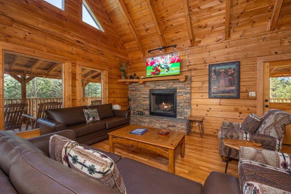 Living room with fireplace at The Roost, a 2 bedroom cabin rental located in Pigeon Forge