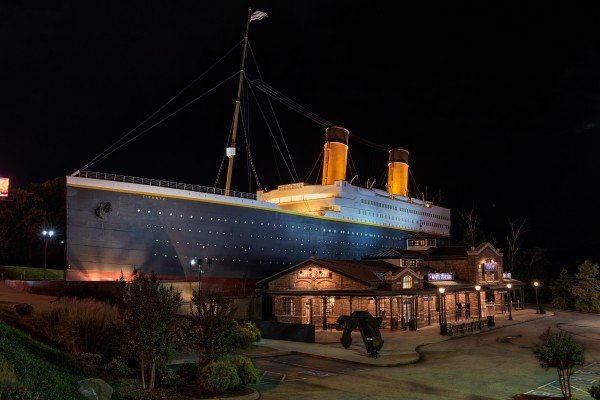 Titanic museum at night near The Roost, a 2 bedroom cabin rental located in Pigeon Forge