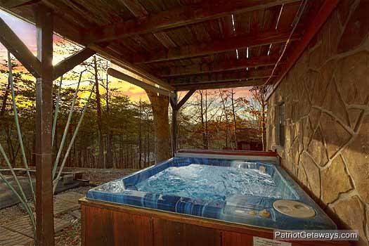 Lower level deck with hot tub at Pine Splendor, a 5 bedroom cabin rental located in Pigeon Forge