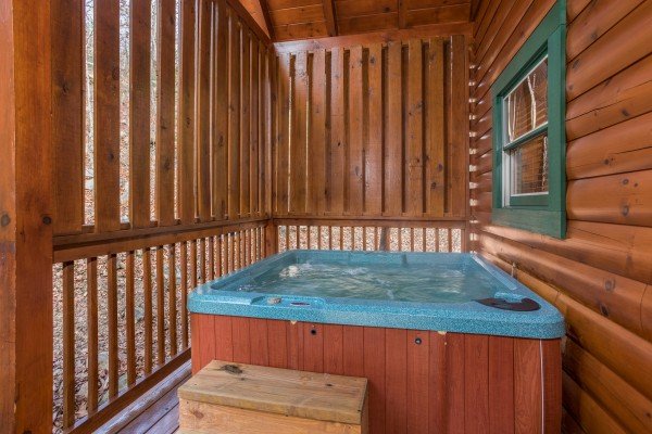 Hot tub at 5 Star Celebration, a 1 bedroom cabin rental located in Pigeon Forge