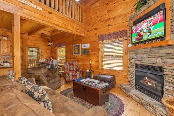 Living room fireplace at Livin' Simple, a 2 bedroom cabin rental located in Pigeon Forge