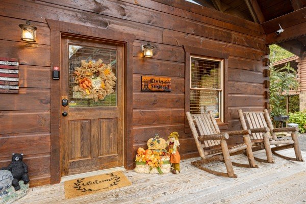Front door and porch at Livin' Simple, a 2 bedroom cabin rental located in Pigeon Forge