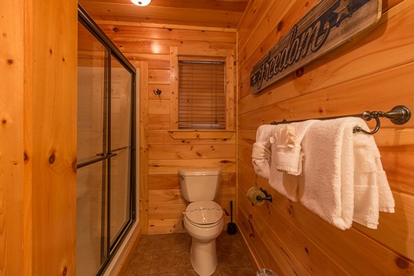 En suite bath with a walk in shower at Rustic Romance, a 2 bedroom cabin rental located in Pigeon Forge