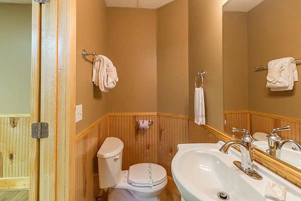Half bath at Location Location Location, a 1 bedroom cabin rental located in Pigeon Forge