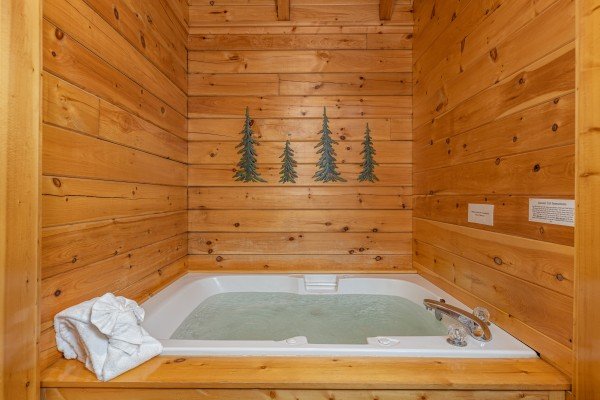 Jacuzzi at Location Location Location, a 1 bedroom cabin rental located in Pigeon Forge