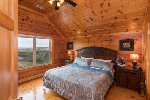 Bedroom with night stands and lamps at Pigeon Forge View, a 6 bedroom cabin rental located in Pigeon Forge