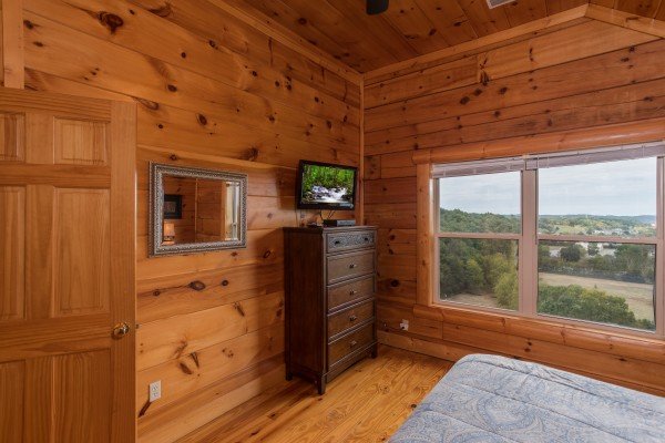 Dresser and TV at Pigeon Forge View, a 6 bedroom cabin rental located in Pigeon Forge