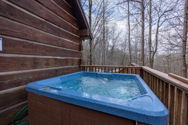 Hot tub at Henwood's Hideaway, a 1 bedroom cabin rental located in Pigeon Forge