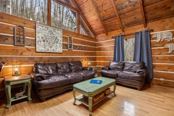 Living room seating  at Henwood's Hideaway, a 1 bedroom cabin rental located in Pigeon Forge