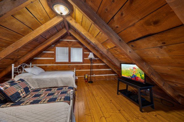 Twin bedroom amenities at Henwood's Hideaway, a 1 bedroom cabin rental located in Pigeon Forge