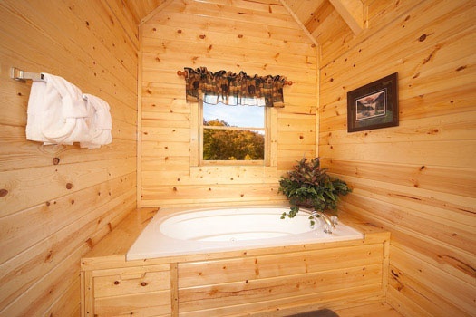 Jacuzzi tub in second floor bedroom at Big Bear Cove, a 3-bedroom rental located in Gatlinburg