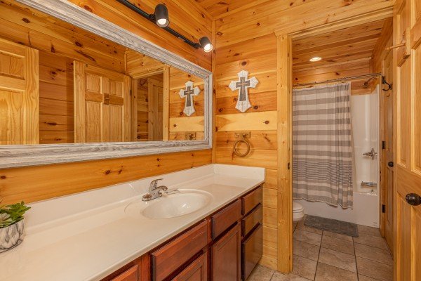 Bathroom with large vanity at Pinot Paradise, a 3 bedroom cabin rental located in Pigeon Forge