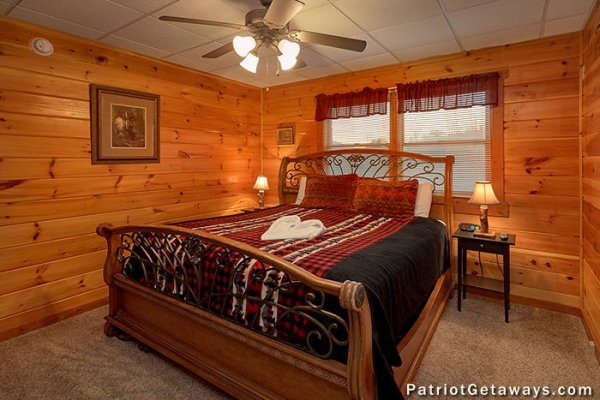 Bedroom with a king bed at The Big View, a 4 bedroom cabin rental located in Pigeon Forge