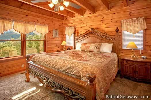 King bedroom with en suite bath at The Big View, a 4 bedroom cabin rental located in Pigeon Forge