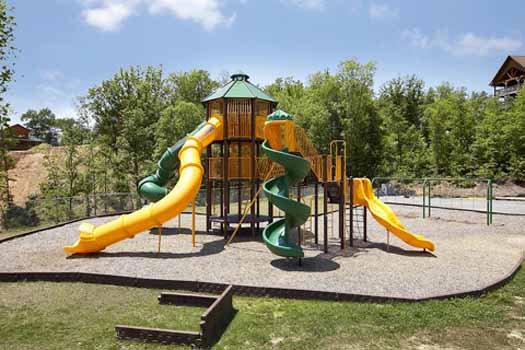 Resort playground at The Big View, a 4 bedroom cabin rental located in Pigeon Forge