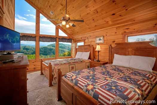 Third floor bedroom with two queen beds at The Big View, a 4 bedroom cabin rental located in Pigeon Forge