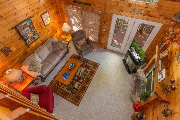 Looking at the living room at A Honeymoon Haven, a 1 bedroom cabin rental located in Gatlinburg