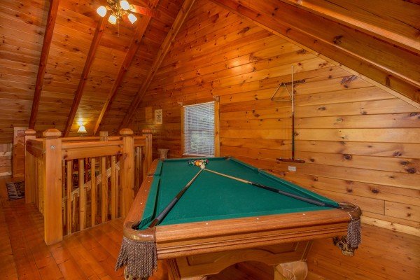 Pool table at A Honeymoon Haven, a 1 bedroom cabin rental located in Gatlinburg