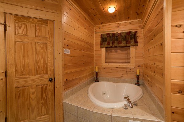 Heart shaped jacuzzi at 5 Little Cubs, a 2 bedroom cabin rental located in Pigeon Forge