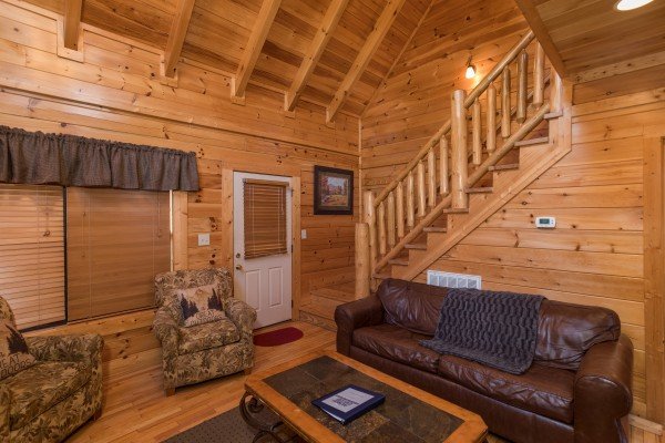Sofa and chairs in the living room at 5 Little Cubs, a 2 bedroom cabin rental located in Pigeon Forge