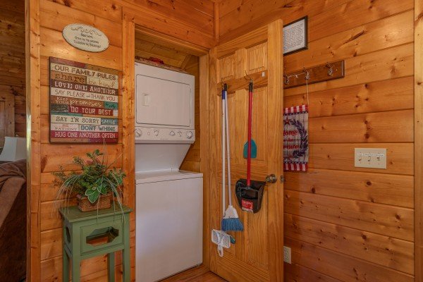 Stacked washer and dryer at Majestic Mountain, a 4 bedroom cabin rental located in Pigeon Forge