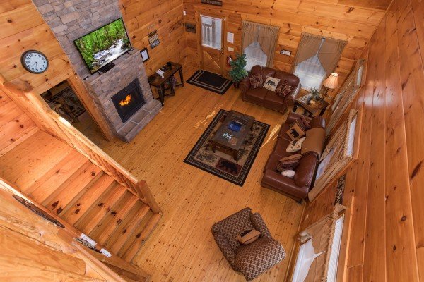 Looking down at the living room at Moonshine Memories, a 2 bedroom cabin rental located in Gatlinburg