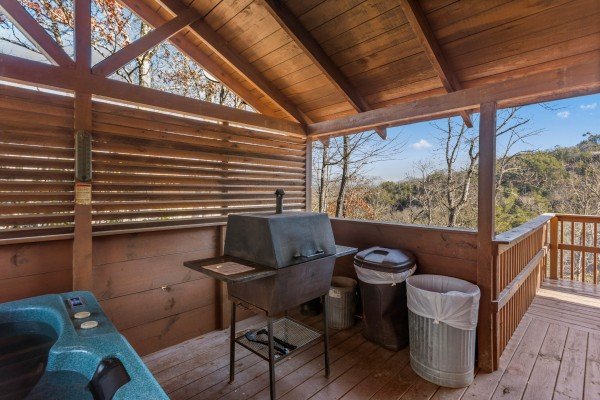Deck with a grill at Mountain Magic, a 1 bedroom cabin rental located in Pigeon Forge