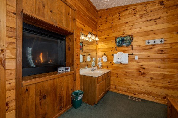 Bathroom TV at A Dream Romance, a 1 bedroom cabin rental located in Gatlinburg