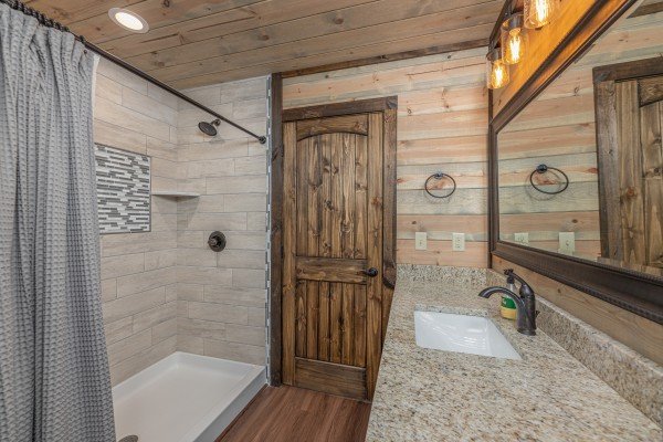 Bathroom with a large walk in shower at Heaven's Hill, a 3 bedroom cabin rental located in Gatlinburg