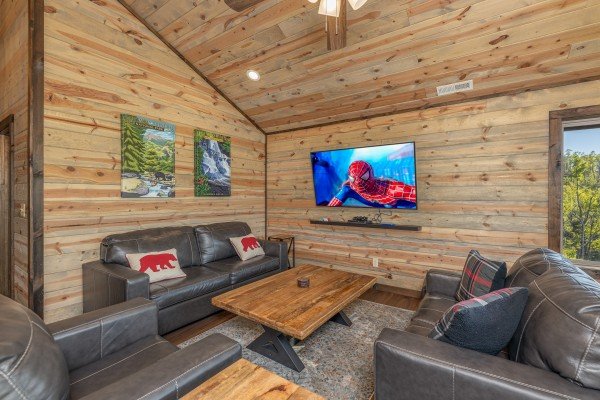 Loft with TV and seating at Heaven's Hill, a 3 bedroom cabin rental located in Gatlinburg