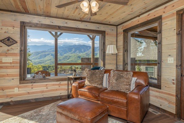 Leather loveseat and a view at Heaven's Hill, a 3 bedroom cabin rental located in Gatlinburg