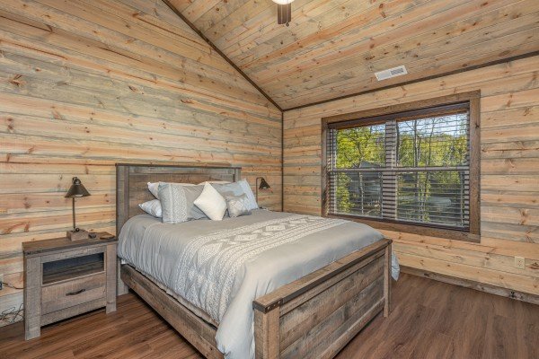 Lofted bedroom with two night stands and lamps at Heaven's Hill, a 3 bedroom cabin rental located in Gatlinburg