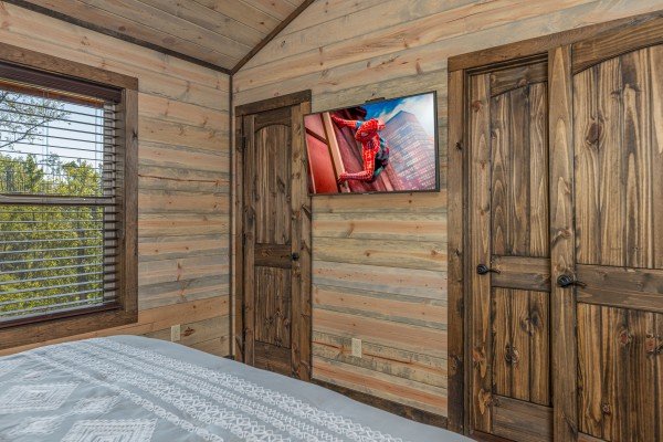 TV in a bedroom at Heaven's Hill, a 3 bedroom cabin rental located in Gatlinburg