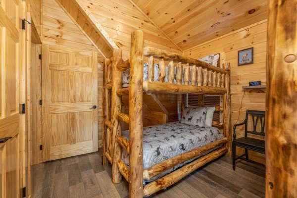 Bunk beds in a bedroom at Wet Feet Retreat, a 5 bedroom cabin rental located in Pigeon Forge