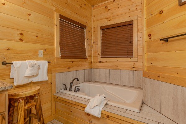 Jacuzzi in a bathroom at Wet Feet Retreat, a 5 bedroom cabin rental located in Pigeon Forge