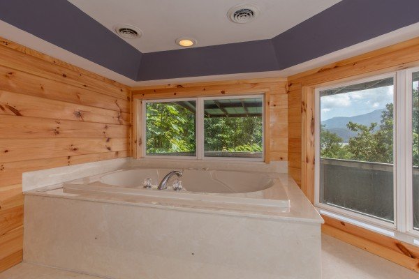 Jacuzzi at The Majestic, an 8 bedroom cabin rental located in Gatlinburg