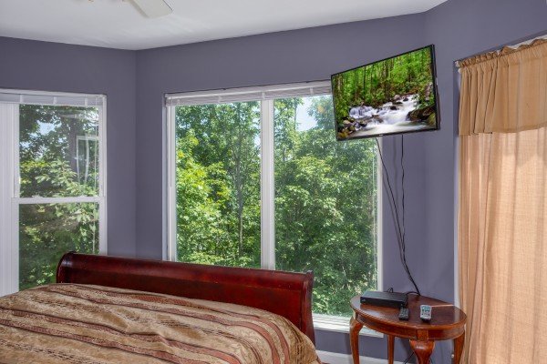 Bedroom with a TV at The Majestic, an 8 bedroom cabin rental located in Gatlinburg