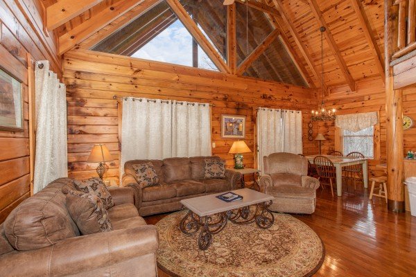 Sofa, loveseat, and chair at The Cowboy Way, a 4 bedroom cabin rental located in Pigeon Forge