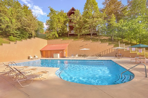 Resort pool at The Cowboy Way, a 4 bedroom cabin rental located in Pigeon Forge