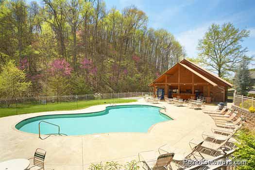 Resort pool at The Cowboy Way, a 4 bedroom cabin rental located in Pigeon Forge