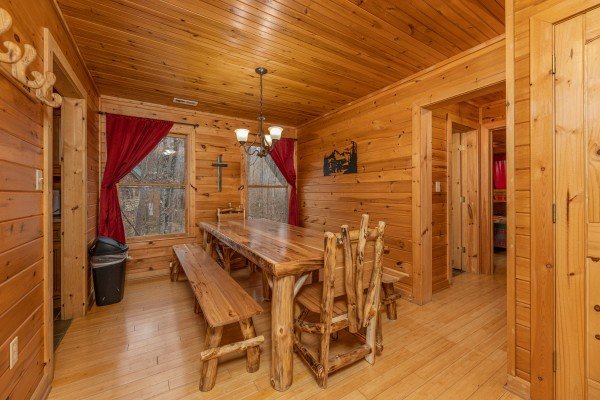 Dining room with seating for 8 at Cabin Life, a 2 bedroom cabin rental located in Pigeon Forge