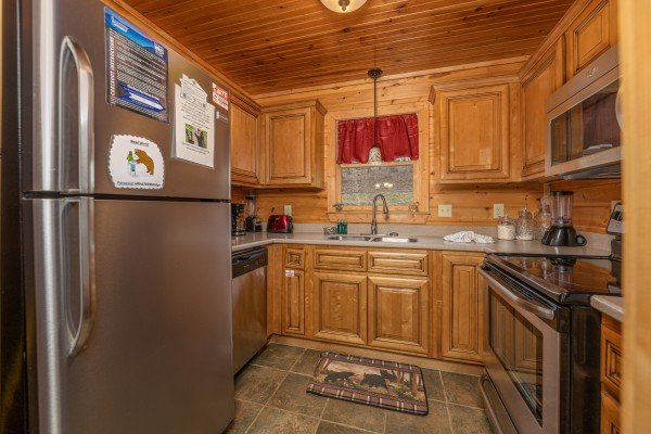 Kitchen with stainless appliances at Cabin Life, a 2 bedroom cabin rental located in Pigeon Forge