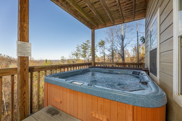 Hot tub on the deck at Le Bear Chalet, a 7 bedroom cabin rental located in Gatlinburg