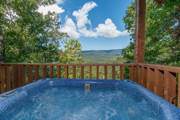 Hot tub and mountain view at Cupid's Crossing, a 1 bedroom cabin rental located in Pigeon Forge