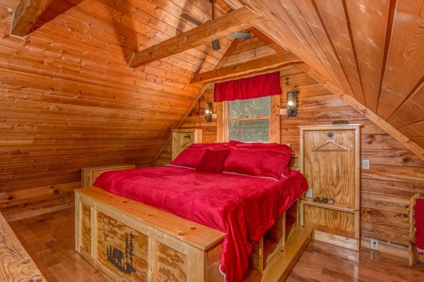 Bedroom in the loft at Cupid's Crossing, a 1 bedroom cabin rental located in Pigeon Forge