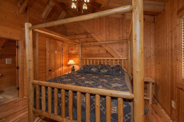 Four post bed at Bear Mountain, a 2 bedroom cabin rental located in Pigeon Forge
