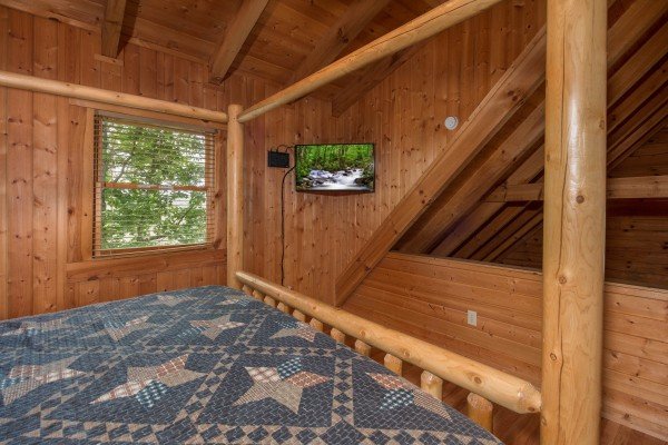 TV in a bedroom at Bear Mountain, a 2 bedroom cabin rental located in Pigeon Forge