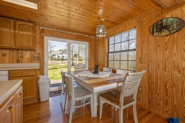 Dining table at A Mountain Hyde-a Way, a 2 bedroom cabin rental located in Pigeon Forge