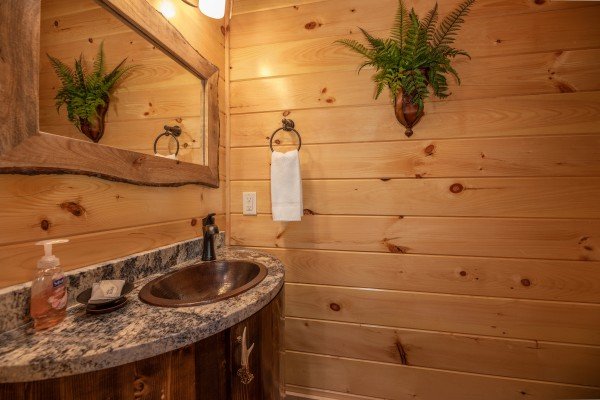 Bath with custom vanity at Elk Horn Lodge, a 5 bedroom cabin rental located in Gatlinburg